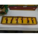 A full set of six lead marching band soldiers in their original box