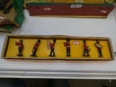 A full set of six lead marching band soldiers in their original box