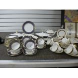 A quantity of Royal Doulton 'Imperial Blue' dinnerware and Royal Doulton 'Harlow' teaware