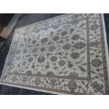 A modern Turkish carpet having floral design with a cream field, 290 x 200cm