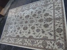 A modern Turkish carpet having floral design with a cream field, 290 x 200cm