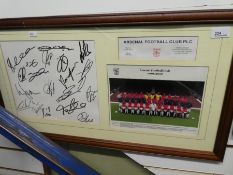 A signed Arsenal Football Club pennant, by 19 players, dated 2006, two other signed photographs incl