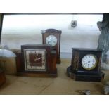 Four various mantel clocks, stamps and a box of sundry
