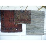 A modern Gabbeh rug, 160 x 13 cms and two other rugs