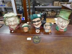 Two Beswick character jugs and four Royal Doulton examples