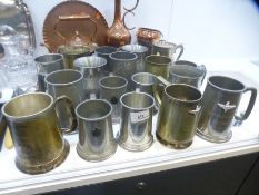 A quantity of tankards, having military engravings and sundry