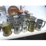 A quantity of tankards, having military engravings and sundry