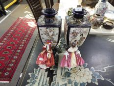 A pair of Japanese Satsuma vases (one damaged to rim) and two Royal Doulton ladies