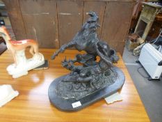 An old Spelter figure of rearing horse and tied man