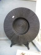 Robert Welch; a cast iron circular plate, 30 cms