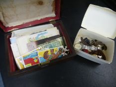 A small quantity of postcards, watches and sundry