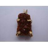 A modern gemstone pendant made from large rectangular possibly Orange River Quartz segment, with 9ct