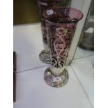 A heavy silver pierced case cover with cranberry glass vase insert.  Of pierced decorative design, h