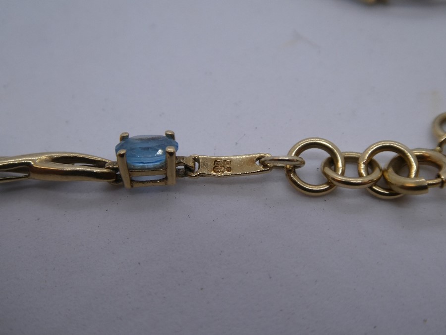 Pretty 9ct yellow gold bracelet set with 9 pale blue stones, marked 375 - Image 3 of 4
