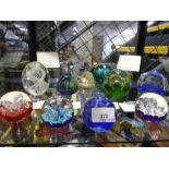 A quantity of Caithness paperweights and others