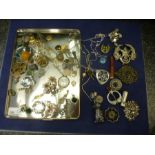 Tray of costume jewellery to include Celtic design brooch, military Swagger stick handle, enamelled