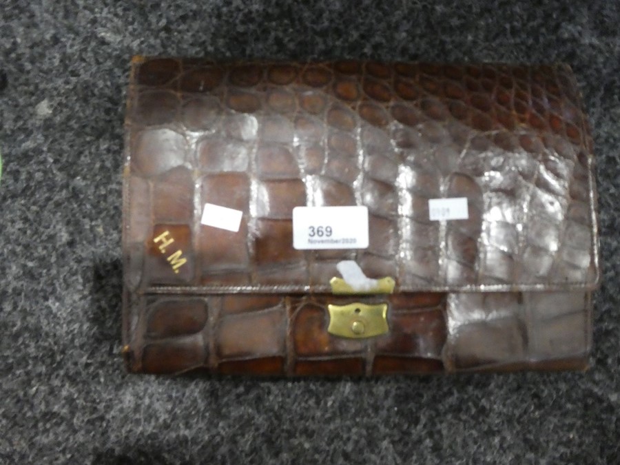A Crocodile leather clutch bag