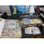 A small carton of used stamps, some in albums and sundry