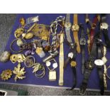 Two boxes of costume jewellery including necklaces, watches, hardstone pendants, whistle, compact, e