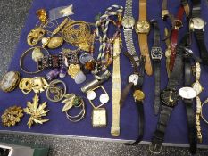 Two boxes of costume jewellery including necklaces, watches, hardstone pendants, whistle, compact, e