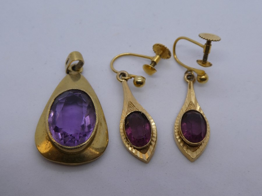 9ct amethyst set pendant and pair of 9ct clip on amethyst earrings, both marked 9ct, gross weight ap