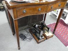 A reproduction mahogany side table having two drawers, 99cms