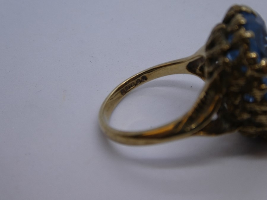 9ct yellow gold dress ring with large central Sapphire surrounded by clear stones, size Q, together - Image 3 of 5