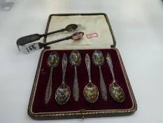 A silver pair of Victorian tongs, worn, hallmarked London 1870, maker's mark unknown, along with a c