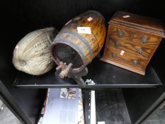 A pitch pine miniature chest of drawers, a large nut and a small barrel on stand