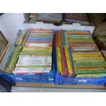 A quantity of children's books including two trays of ladybird examples