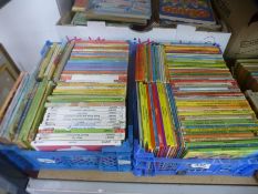 A quantity of children's books including two trays of ladybird examples