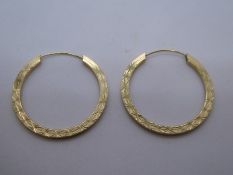 Pair of 9ct yellow gold hoop earrings marked 9ct, weight approx 1.2g