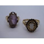 Two 9ct yellow gold dress rings, one set with central opal surrounded by garnets, size S, gross weig