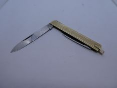 Vintage 'Rostfrei' penknife with engine turned decoration, marked 9ct