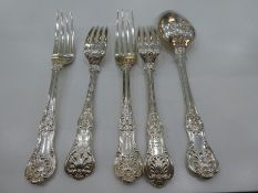 Four heavy silver forks and one silver serving spoon.  Forks hallmarked London & Exeter, possibly Ge