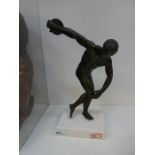 A vintage metal figure of a Discus thrower on a recent marble base, height approx 30 cms