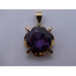 Pretty 14K yellow gold floral design pendant with large central faceted amethyst diameter approx 2.5
