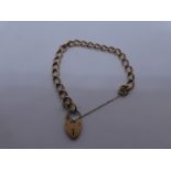 9ct Rose gold bracelet with heart shaped padlock and safety chain, marked 9ct, weight approx 6.8g
