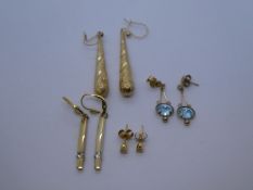 Collection of 9ct yellow gold and unmarked earrings including pair of drop earrings set with a pale