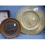 A death plaque awarded to Alfred George Ward and a Chinese brass plate decorated dragons