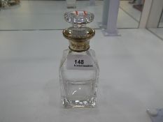 A very heavy high quality decanter, silver topped, by W I Broadway & Co., Birmingham, 2003. Total he