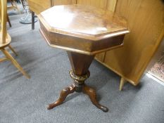 A Victorian Burr walnut trumpet sewing table