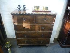 An antique Colonial hardwood military style chest in two sections with iron side handles, 99 cms