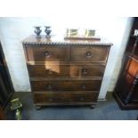 An antique Colonial hardwood military style chest in two sections with iron side handles, 99 cms