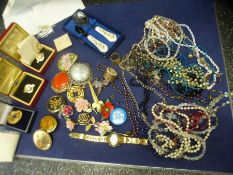 Box costume jewellery to include brooches, watch, necklaces, boxed St John Ambulance badge, etc