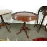 A reproduction tripod table having octagonal top with pierced border, 72 cms