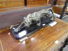 A bronze figure of prowling tiger, unsigned on marble base, 62cms