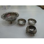 Four items of white metal Persian bowl and trinket dishes.  Very ornate and decorative design of fol