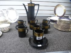 A Portmeirion black and gilt coffee set for 6