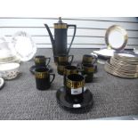 A Portmeirion black and gilt coffee set for 6